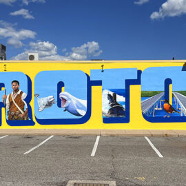 Postcard-style mural at the Groton Shoppers Mart celebrates the past and present of Groton, Connecticut